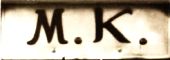 M.K.