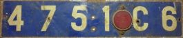 4751 C6 (a piros fényvisszaverős elem nem része a rendszámnak)